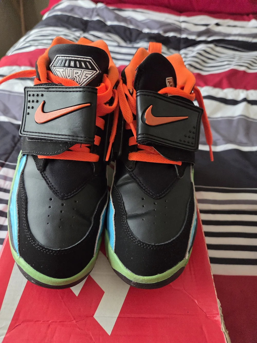 Nike Kids Black & Orange Athletic Shoes with Blue and Green Accents